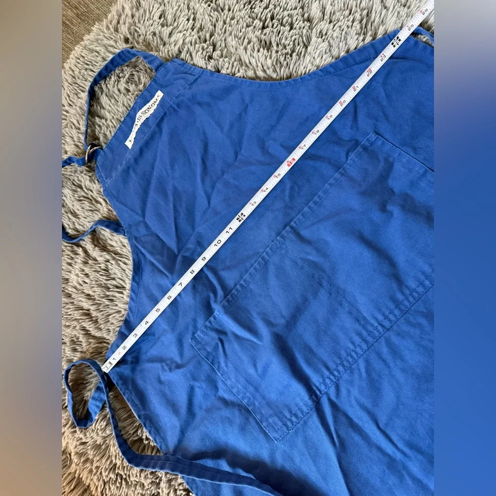 Set of Two Williams-Sonoma cotton bib aprons in red and blue.